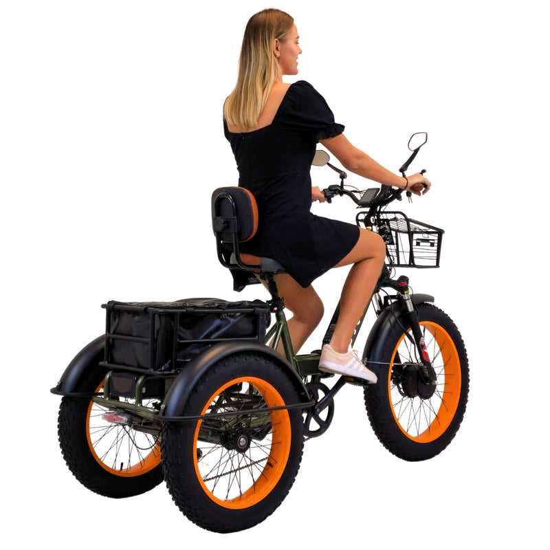 Image featuring a woman riding the 3SCORE Hunter Edition Dual Battery foldable e-trike with fat tires, showcasing its versatility. This electric bike with 3 wheels for adults is foldable, making it convenient for transportation and storage. Also referred to as a three-wheeled e-bicycle or an etrike bike for seniors, this three-wheeler electric bicycle is suitable for adults seeking stability and comfort during rides.