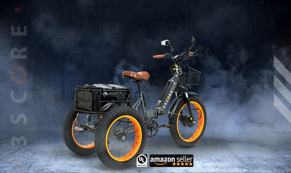   3SCORE e trike adults on a gray background, fat tire electric tricycle UL certified can also be found at Amazon.com. foldable electric tricycle detail of rear wheels, brake lights with blinkers for safety. etrike adults with rear basket and dust cover